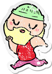 distressed sticker of a cartoon man with beard