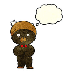 cartoon little black bear with thought bubble