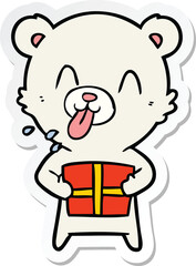 sticker of a rude cartoon polar bear sticking out tongue with present