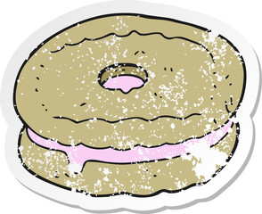 retro distressed sticker of a cartoon biscuit