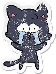distressed sticker of a cartoon crying cat