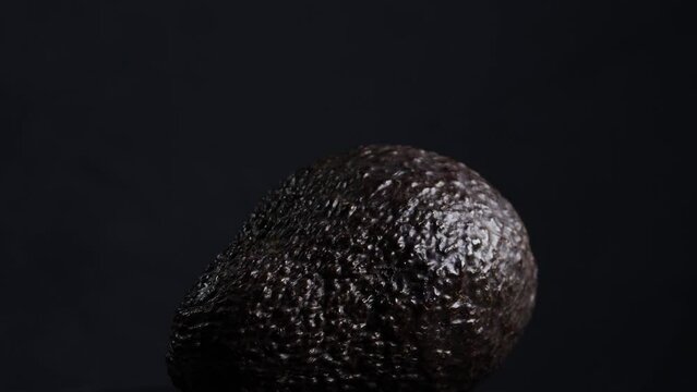 a ripe avocado is spinning 4k 30fps video
