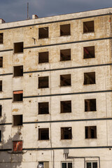 Fototapeta na wymiar Ruined residential building close up