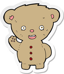 sticker of a cartoon teddy bear waving