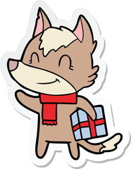 sticker of a friendly cartoon wolf with present