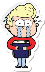 sticker of a cartoon crying man holding book