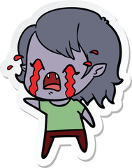sticker of a cartoon crying vampire girl