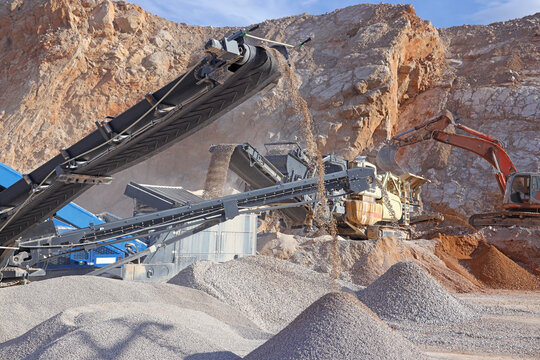 The quarry, stone crushing and production of building materials. Open pit mining and processing plant for crushed stone.