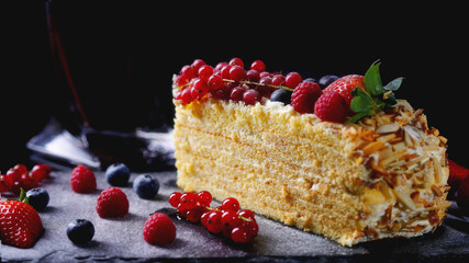 Large, beautiful homemade cake with different berries, homemade food, for sweet tooths.