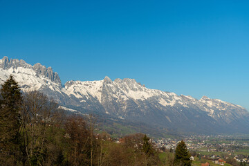 Fototapeta na wymiar Snow covered mountain panorama in Grabs in Switzerland