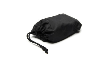 Black drawstring bag on white background. Fabric small bag. Isolated pouch.