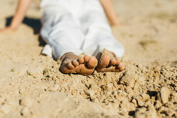 feet in the sand