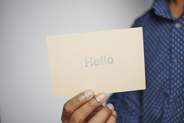 close up of hello text in blue color on a envelope 