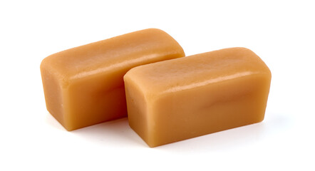 Caramel candies, isolated on white background.