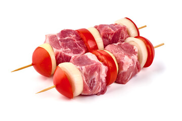 Raw pork skewers, ready to cook, BBQ, isolated on white background.