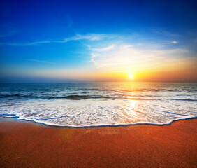 beautiful sandy beach and sea a sunset time