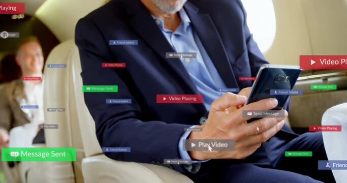 Animation of social media icons over caucasian senior businessman using smartphone in a plane