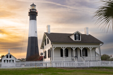 Sunset view of the historic Tybee Island lighthouse from Tybee Island Georgia - 576134905