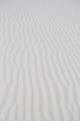 Fototapeta na wymiar white sand ripples in the sand at White Sands National Park