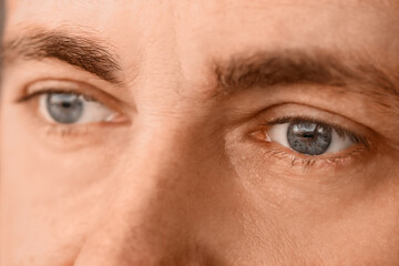 Mature man with blue eyes, closeup