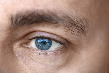 Mature man with blue eyes, closeup