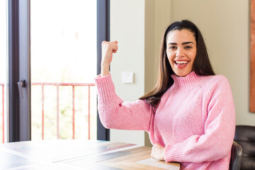 pretty caucasian woman feeling happy, positive and successful, motivated when facing a challenge or celebrating good results