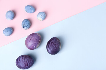 Painted Easter eggs on colorful background