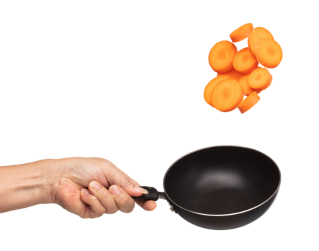 Carrot fresh fly float in Air turn to slice shape. Beta Carotene orange color in Carrot is good health. Many Dice cube carrot flying throw up in Air by cooking pan. White background isolated