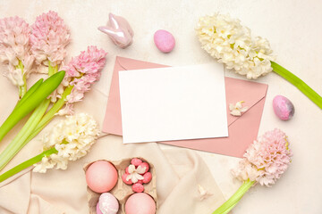 Naklejka na ściany i meble Composition with beautiful hyacinth flowers, blank greeting card and Easter eggs on beige background