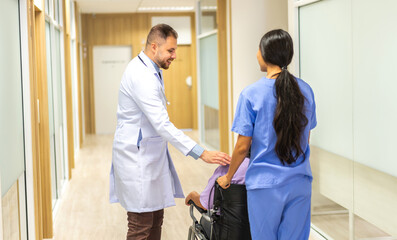 Fototapeta premium Man doctor wearing uniform with stethoscope service help support discussing and consulting talk to sick senior asian woman patient about checkup result information in hospital.healthcare and medicine