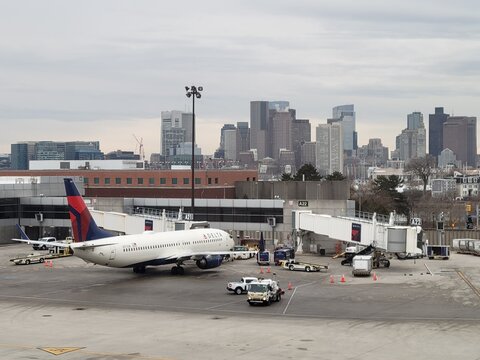 Delta Air Lines Boeing 737 parked at gate at Boston Logan International Airport - Boston, Massachusetts, USA