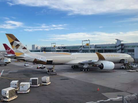 Etihad Airways Airbus A350 parked at gate at John F. Kennedy International Airport - New York, USA	