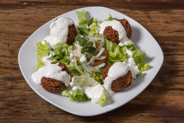 Falafel on salad leaves