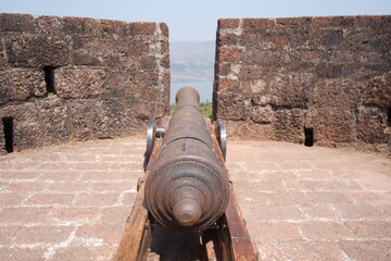 Historic cannon at Bankot Fort, Maharashtra – a relic of Shivaji Maharaj's era, showcasing India's rich Maratha heritage and history