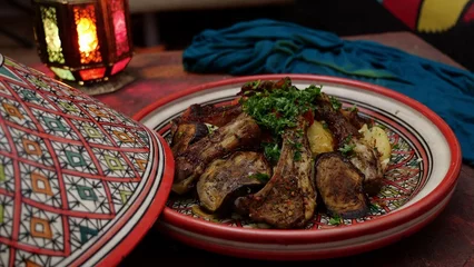 Zelfklevend Fotobehang Authentic Moroccan Lamb Tagine. Festive hot food for the Eid © Fevziie