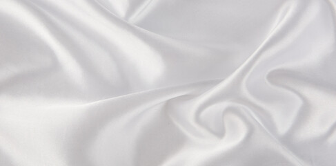 Smooth elegant white silk or satin luxury cloth texture background. 