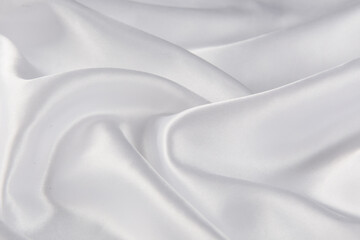 Obraz premium Smooth elegant white silk or satin luxury cloth texture background. 