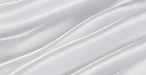 Smooth elegant white silk or satin luxury cloth texture background. 