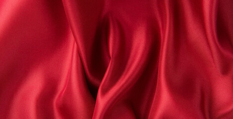 Smooth elegant red silk or satin luxury cloth texture background.