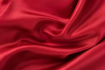 Fototapeta na wymiar Smooth elegant red silk or satin luxury cloth texture background.