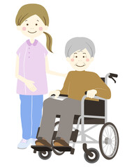 介護士の女性と車椅子のおじいさん