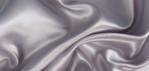 gray or silver silk satin texture background.