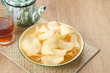 Keripik Singkong or Cassava Chips, Indonesian traditional snack. Served in bowl
