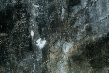 Concrete wall background pattern. old cement surfaces are black molded and cracked