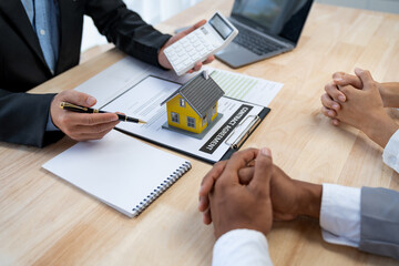 An entrepreneur, business owner, accountant, and young Asian real estate agent who uses home-buying...