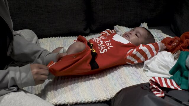 Cute 3 Month Old Baby Wearing Red My 1st Christmas Outfit Laid On Blanket Getting A Nappy Change