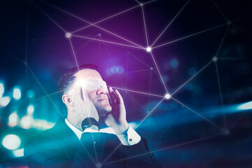 Businessman operates a hologram screen showing business network