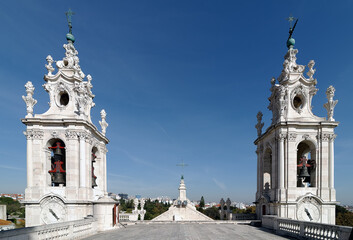 Fototapeta na wymiar The bell towers of the Estrela Basilica or the Royal Basilica and Convent of the Most Sacred Heart of Jesus in Lisbon, Portugal.Ordered built by Queen Maria I of Portugal and consecrated 15th November