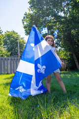 Girl celebrates the national holiday,
Drapeau qu&eacute;bec - Happy Quebec Day
Quebec's National Holiday,
La Fete Nationale du Quebec,
St. Jean-Baptiste