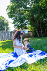 celebrates the national holiday,
Drapeau qu&eacute;bec - Happy Quebec Day
Quebec's National Holiday,
La Fete Nationale du Quebec,
St. Jean-Baptiste
